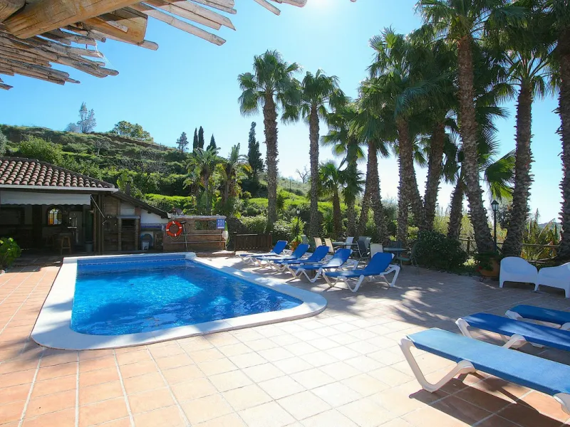 A rare opportunity to own a truly enchanting estate near the picturesque Mijas Pueblo. Set on an expansive 16,000 m² plot, this gated property offers breathtaking panoramic views surrounded by fruit trees, almond trees, and olive groves, creating a peacef