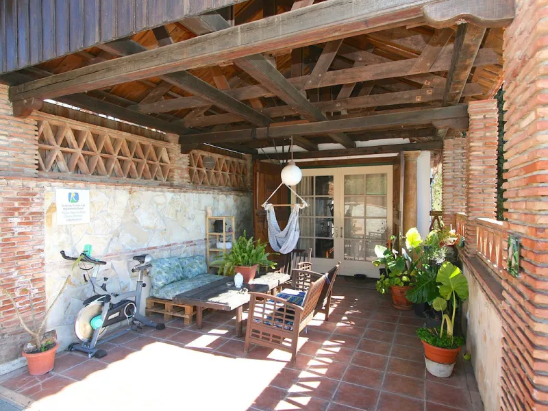 A rare opportunity to own a truly enchanting estate near the picturesque Mijas Pueblo. Set on an expansive 16,000 m² plot, this gated property offers breathtaking panoramic views surrounded by fruit trees, almond trees, and olive groves, creating a peacef