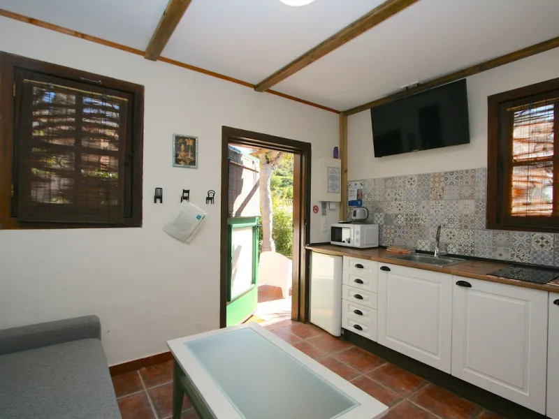 A rare opportunity to own a truly enchanting estate near the picturesque Mijas Pueblo. Set on an expansive 16,000 m² plot, this gated property offers breathtaking panoramic views surrounded by fruit trees, almond trees, and olive groves, creating a peacef