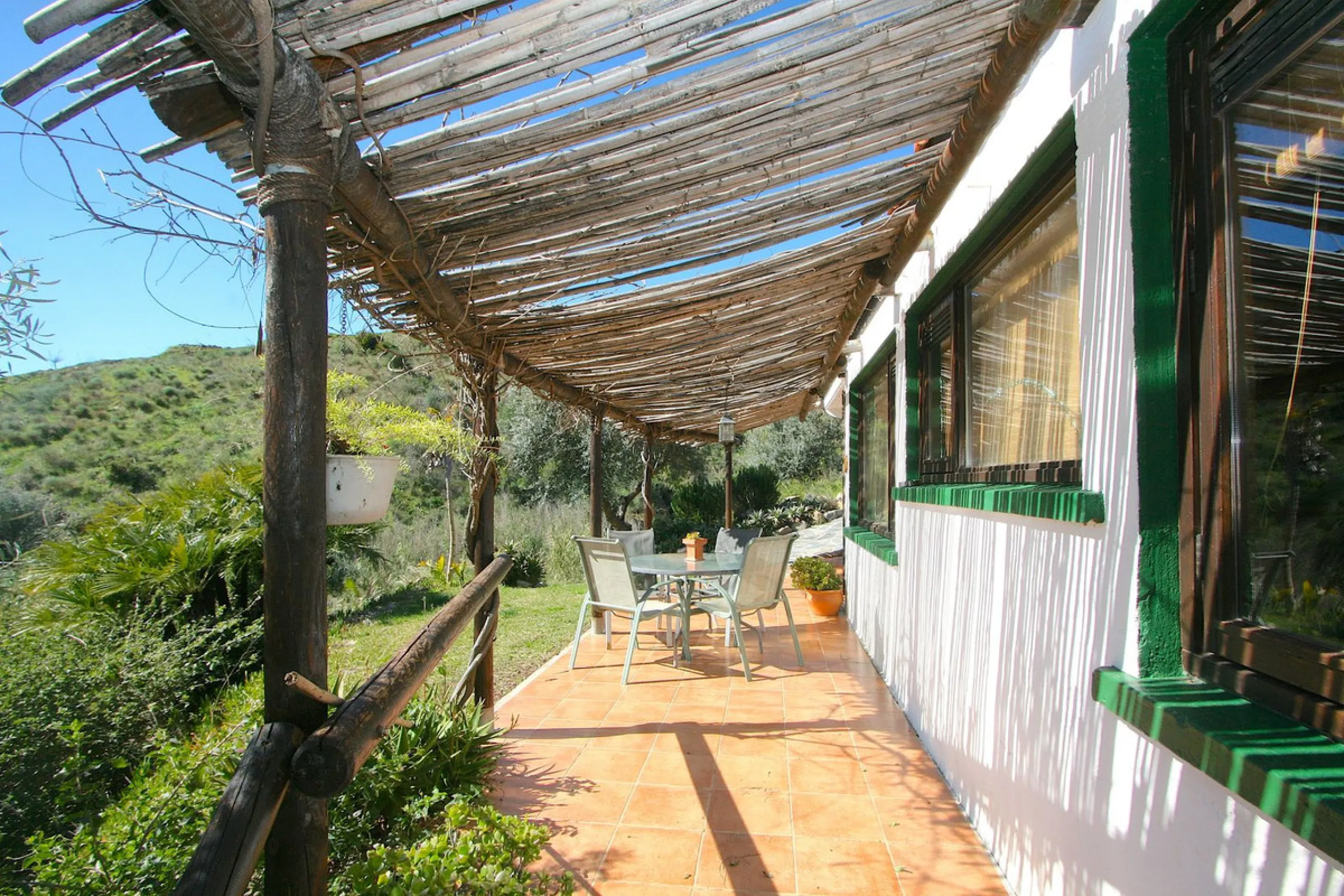 A rare opportunity to own a truly enchanting estate near the picturesque Mijas Pueblo. Set on an expansive 16,000 m² plot, this gated property offers breathtaking panoramic views surrounded by fruit trees, almond trees, and olive groves, creating a peacef