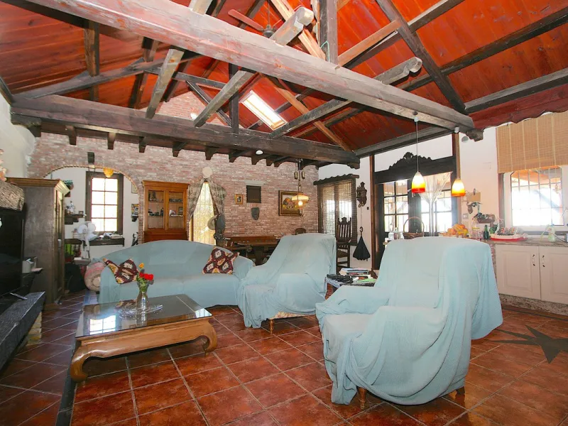 A rare opportunity to own a truly enchanting estate near the picturesque Mijas Pueblo. Set on an expansive 16,000 m² plot, this gated property offers breathtaking panoramic views surrounded by fruit trees, almond trees, and olive groves, creating a peacef