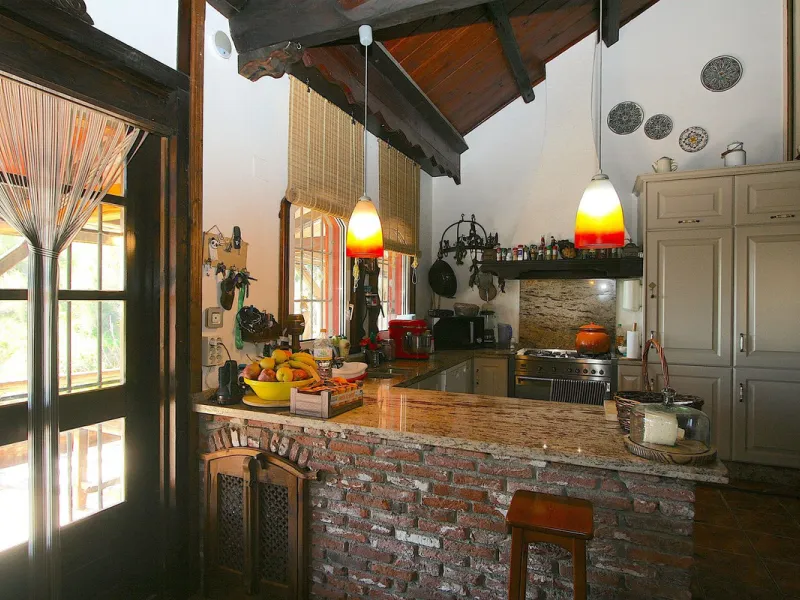 A rare opportunity to own a truly enchanting estate near the picturesque Mijas Pueblo. Set on an expansive 16,000 m² plot, this gated property offers breathtaking panoramic views surrounded by fruit trees, almond trees, and olive groves, creating a peacef