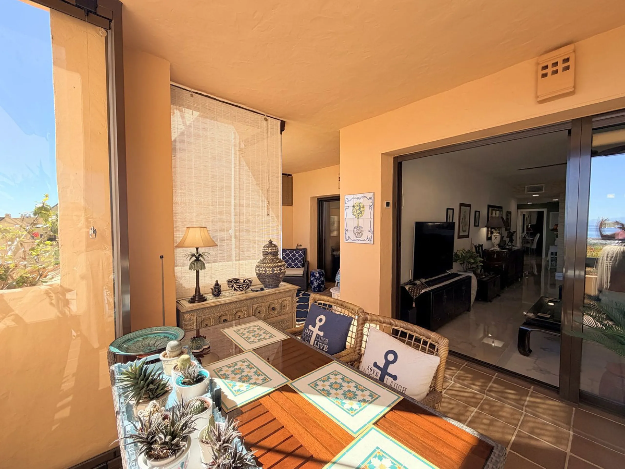 APARTMENT WITH SPACIOUS TERRACE AND STUNNING SEA VIEWS, MANILVA. Discover this magnificent 2-bedroom, 2-bathroom property located in a well-maintained and highly sought-after urbanization in Manilva, ideal both as a permanent residence or an investment. T