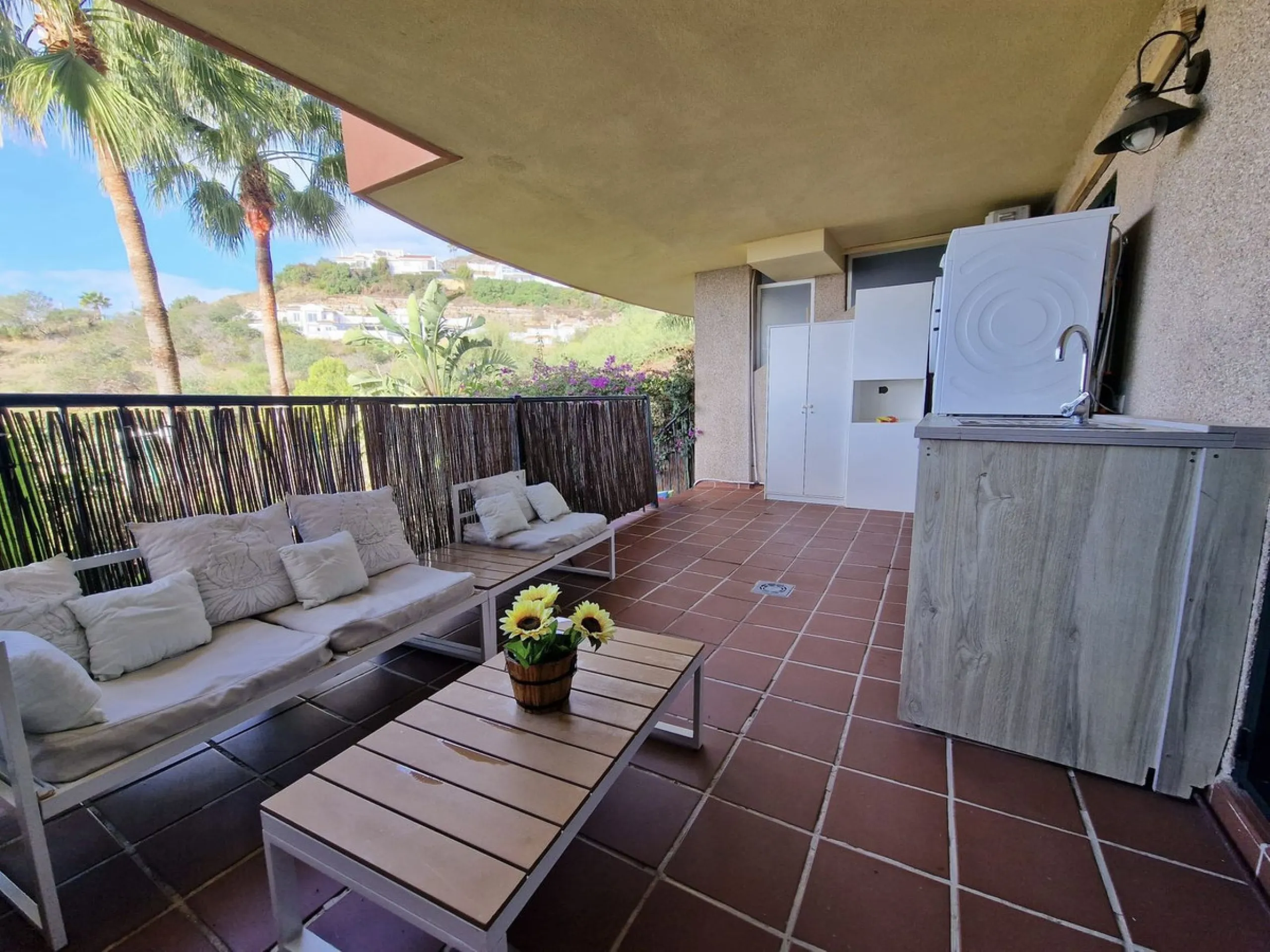 Price reduction !! Immaculate, beautifully reformed, spacious ground floor duplex apartment with 2 terraces, private garden AND sea and pool views!!  Located in a quiet corner of this fabulous community, the apartment, at entry level, consists of hallway,