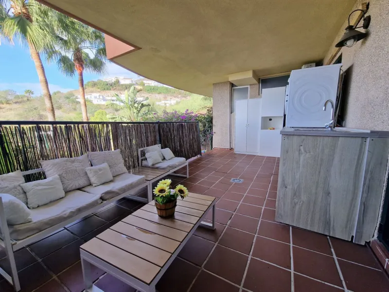 Price reduction !! Immaculate, beautifully reformed, spacious ground floor duplex apartment with 2 terraces, private garden AND sea and pool views!!  Located in a quiet corner of this fabulous community, the apartment, at entry level, consists of hallway,