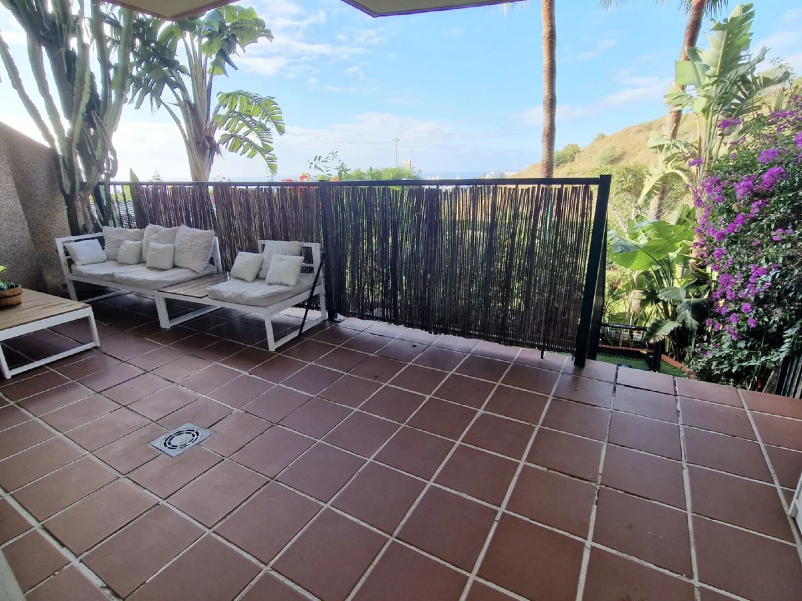 Price reduction !! Immaculate, beautifully reformed, spacious ground floor duplex apartment with 2 terraces, private garden AND sea and pool views!!  Located in a quiet corner of this fabulous community, the apartment, at entry level, consists of hallway,