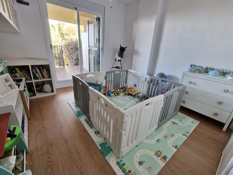 Price reduction !! Immaculate, beautifully reformed, spacious ground floor duplex apartment with 2 terraces, private garden AND sea and pool views!!  Located in a quiet corner of this fabulous community, the apartment, at entry level, consists of hallway,
