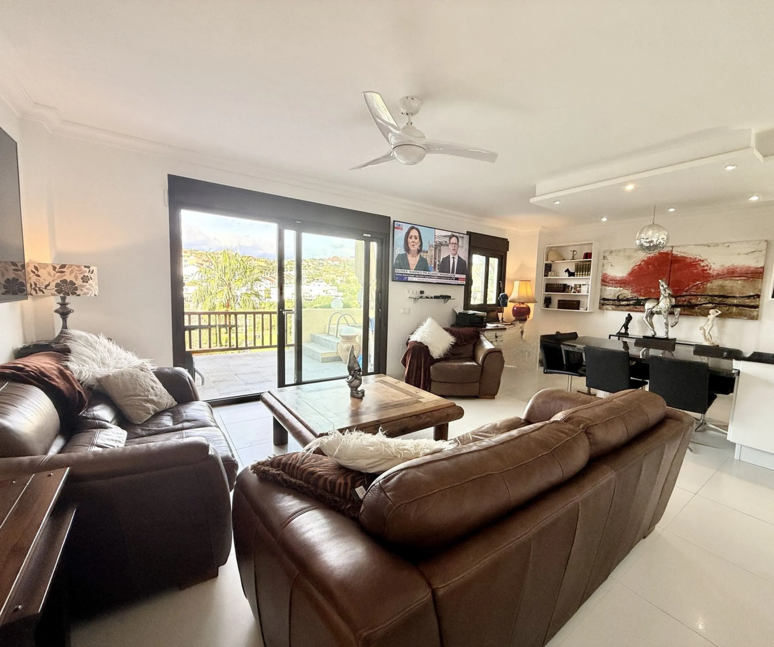 Bright and spacious detached villa with private pool on terrace, yet located in a gated community. This unique property is distributed over two floors, the ground floor comprising a hallway, stunning lounge/dining room with open plan, newly fitted modern 