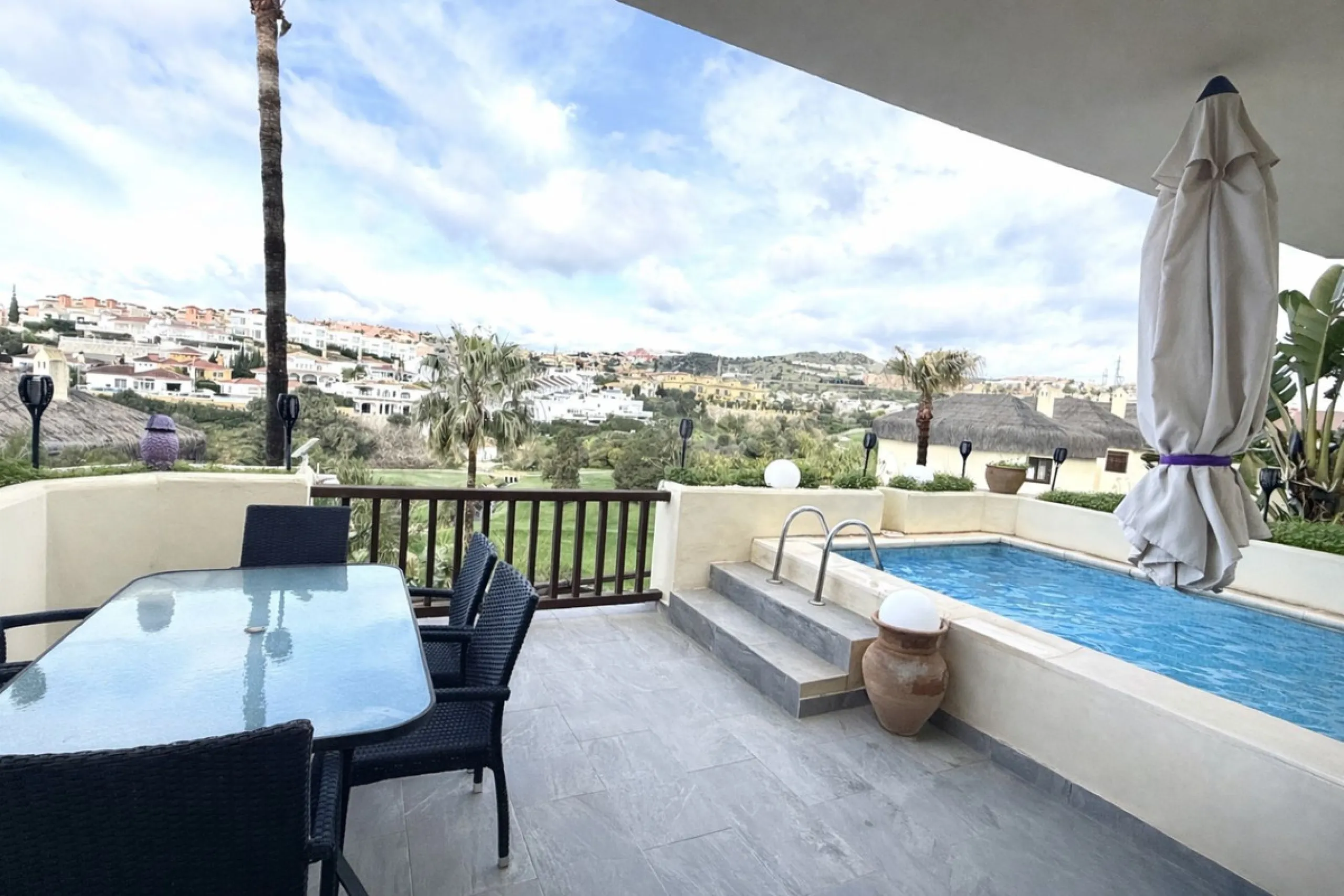 Bright and spacious detached villa with private pool on terrace, yet located in a gated community. This unique property is distributed over two floors, the ground floor comprising a hallway, stunning lounge/dining room with open plan, newly fitted modern 