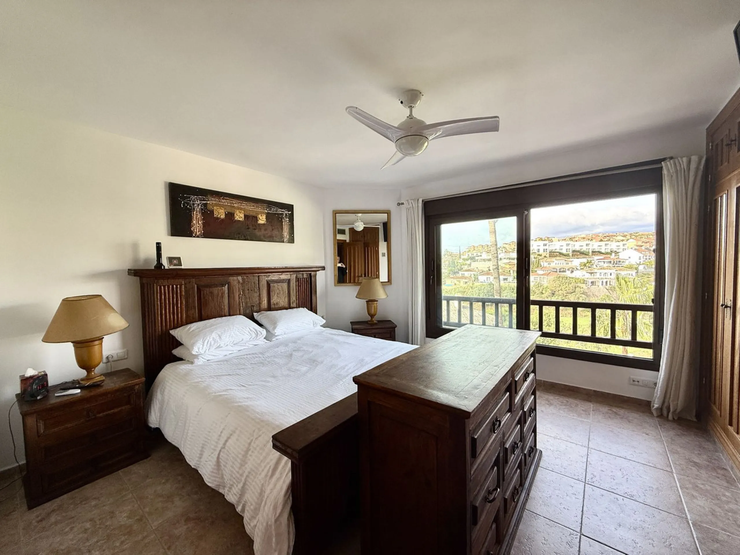 Bright and spacious detached villa with private pool on terrace, yet located in a gated community. This unique property is distributed over two floors, the ground floor comprising a hallway, stunning lounge/dining room with open plan, newly fitted modern 