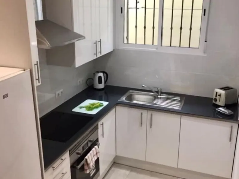 Bright and spacious detached villa with private pool on terrace, yet located in a gated community. This unique property is distributed over two floors, the ground floor comprising a hallway, stunning lounge/dining room with open plan, newly fitted modern 