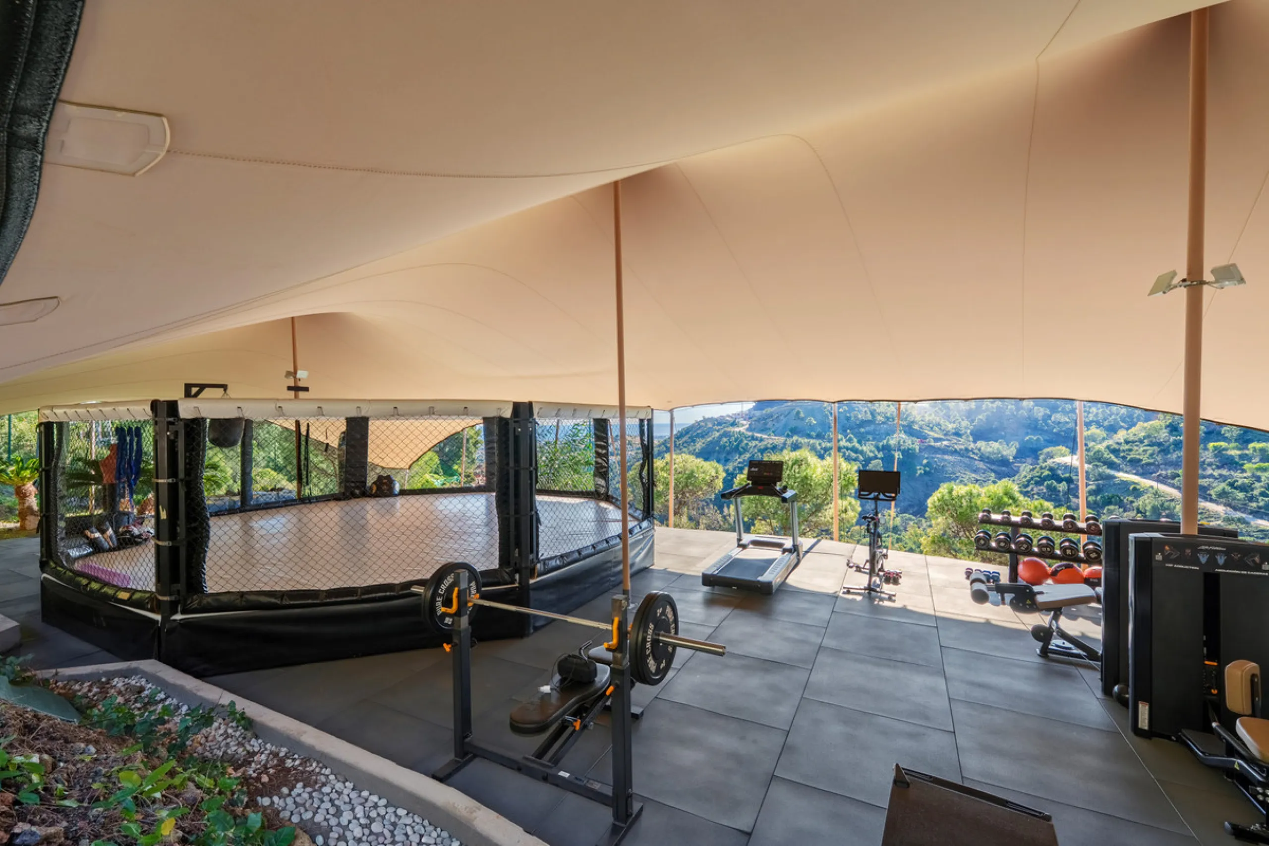A five-bedroom villa in El Madroñal, Benahavís, offering five bathrooms plus a guest cloakroom, with a first floor dedicated to the master suite with dressing room and library alongside a guest ensuite, a ground floor arranged around formal and informal l