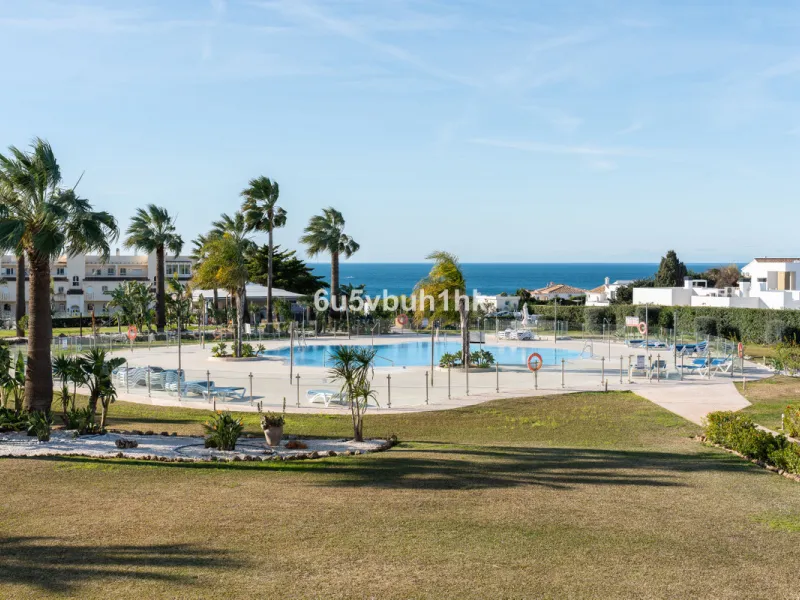 Discover refined coastal living in this beautifully presented 2-bedroom, 2-bathroom apartment, located in Balcones del Chaparral, one of the area's most sought-after residential communities.