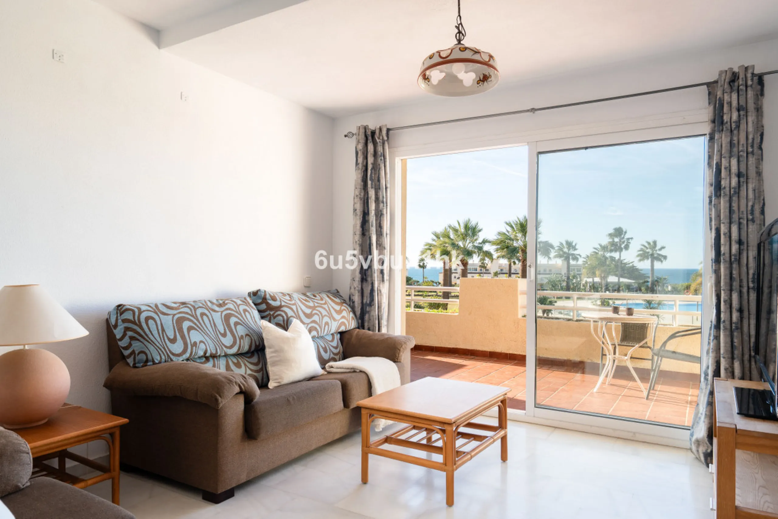 Discover refined coastal living in this beautifully presented 2-bedroom, 2-bathroom apartment, located in Balcones del Chaparral, one of the area's most sought-after residential communities.