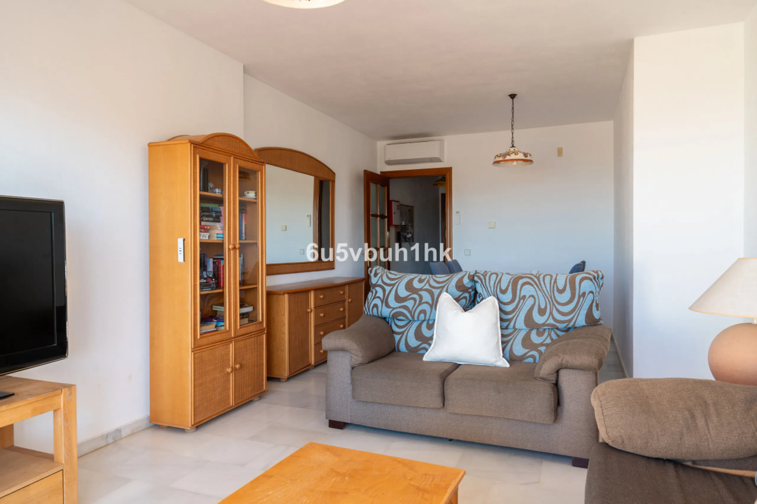 Discover refined coastal living in this beautifully presented 2-bedroom, 2-bathroom apartment, located in Balcones del Chaparral, one of the area's most sought-after residential communities.
