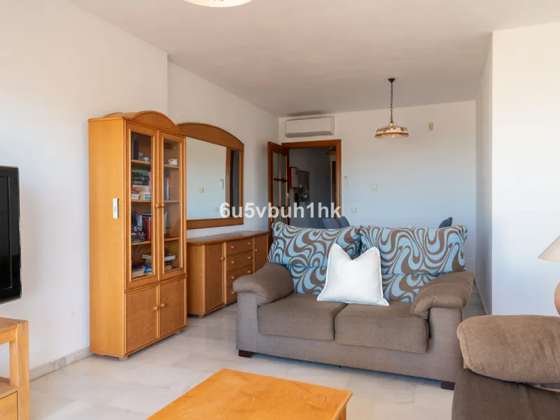 Discover refined coastal living in this beautifully presented 2-bedroom, 2-bathroom apartment, located in Balcones del Chaparral, one of the area's most sought-after residential communities.