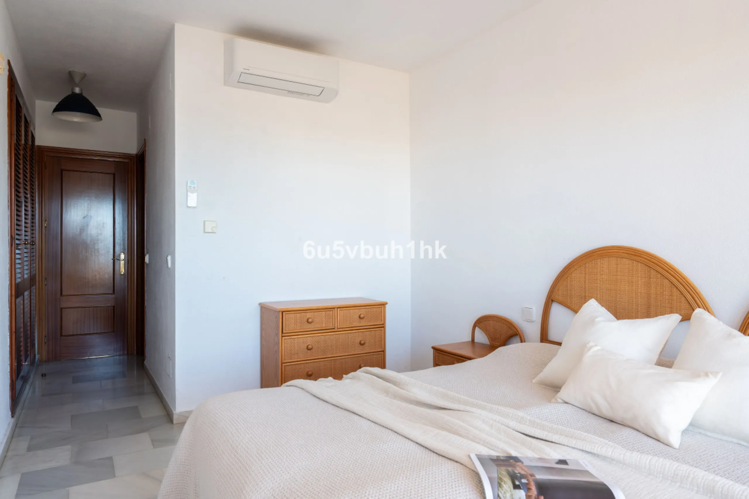 Discover refined coastal living in this beautifully presented 2-bedroom, 2-bathroom apartment, located in Balcones del Chaparral, one of the area's most sought-after residential communities.