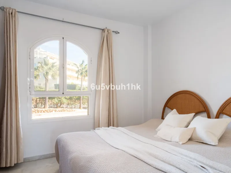Discover refined coastal living in this beautifully presented 2-bedroom, 2-bathroom apartment, located in Balcones del Chaparral, one of the area's most sought-after residential communities.