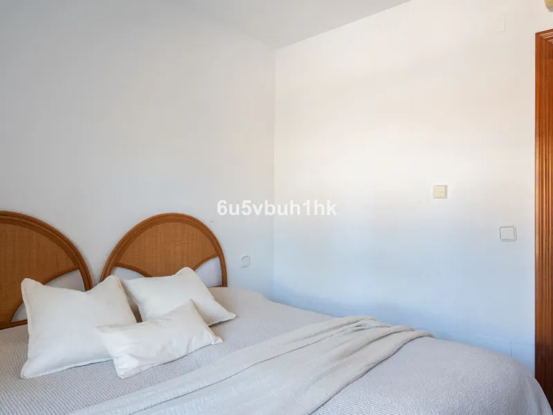 Discover refined coastal living in this beautifully presented 2-bedroom, 2-bathroom apartment, located in Balcones del Chaparral, one of the area's most sought-after residential communities.