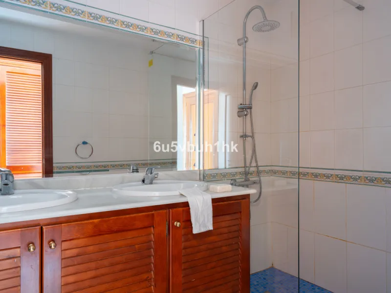 Discover refined coastal living in this beautifully presented 2-bedroom, 2-bathroom apartment, located in Balcones del Chaparral, one of the area's most sought-after residential communities.