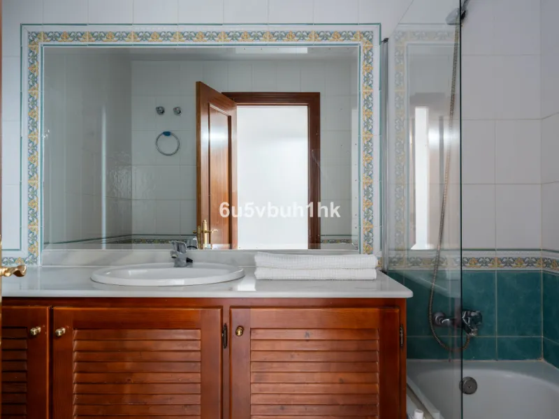 Discover refined coastal living in this beautifully presented 2-bedroom, 2-bathroom apartment, located in Balcones del Chaparral, one of the area's most sought-after residential communities.