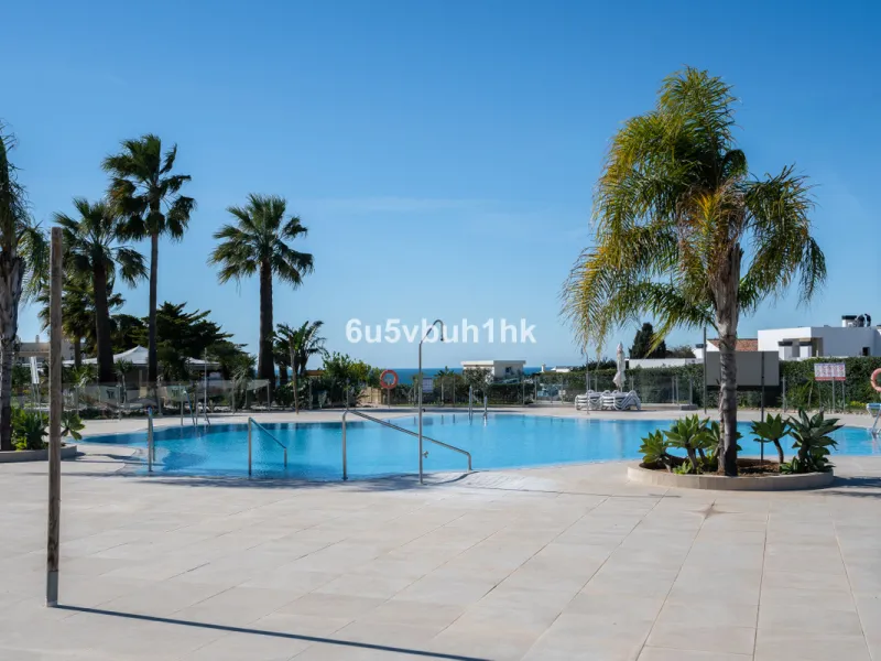 Discover refined coastal living in this beautifully presented 2-bedroom, 2-bathroom apartment, located in Balcones del Chaparral, one of the area's most sought-after residential communities.