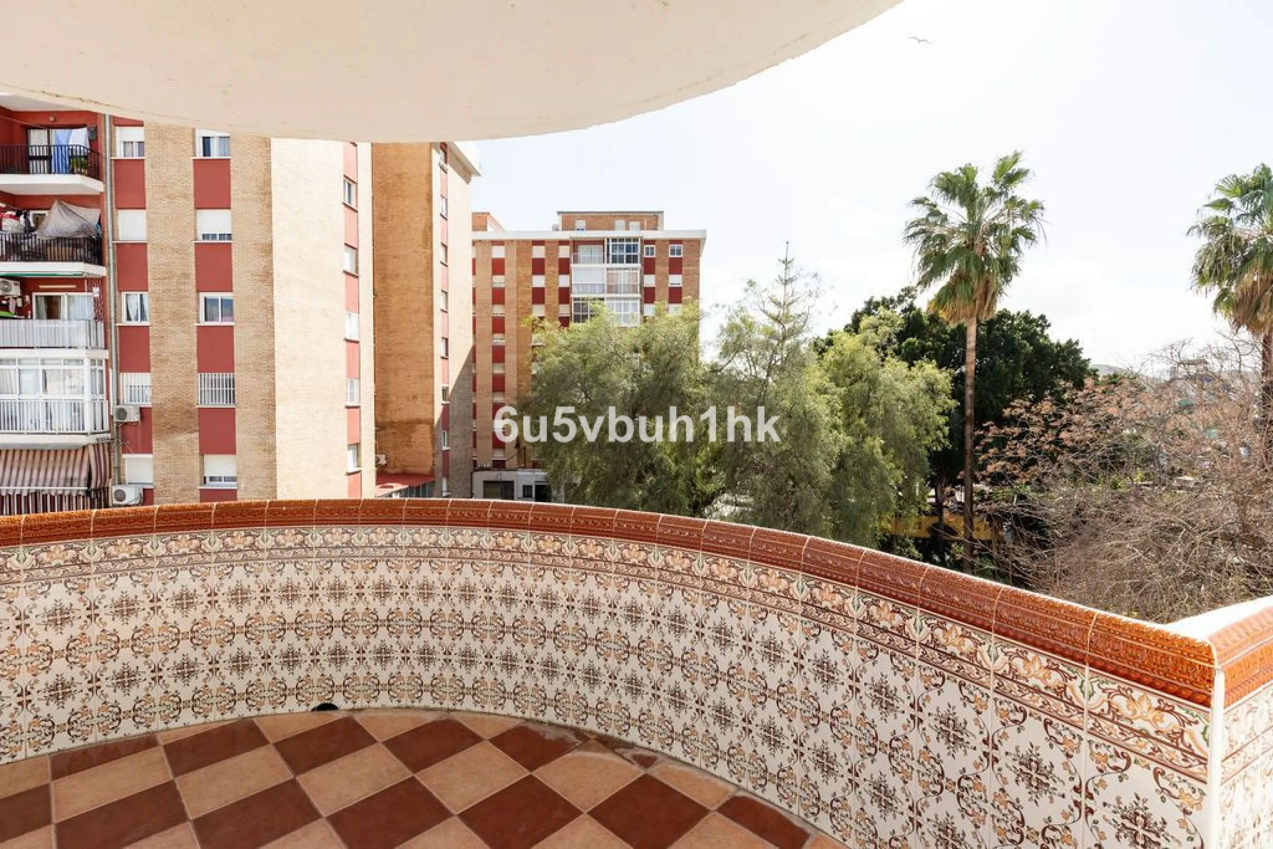 -Spacious three-bedroom apartment with large covered terrace overlooking a park