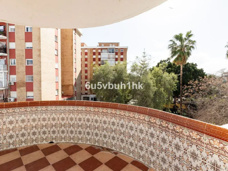 -Spacious three-bedroom apartment with large covered terrace overlooking a park