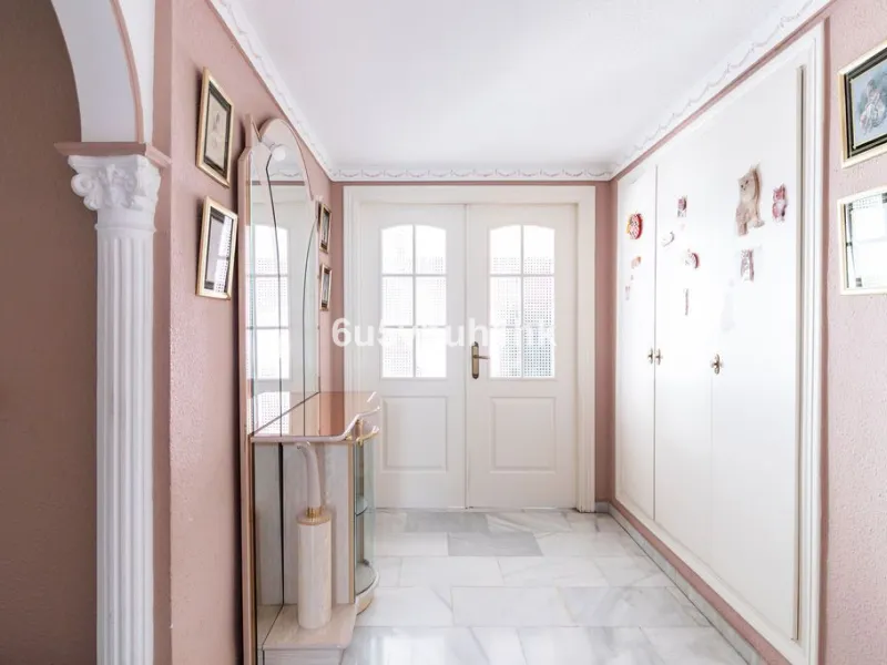 -Spacious three-bedroom apartment with large covered terrace overlooking a park
