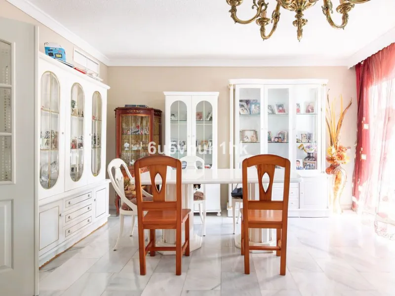 -Spacious three-bedroom apartment with large covered terrace overlooking a park