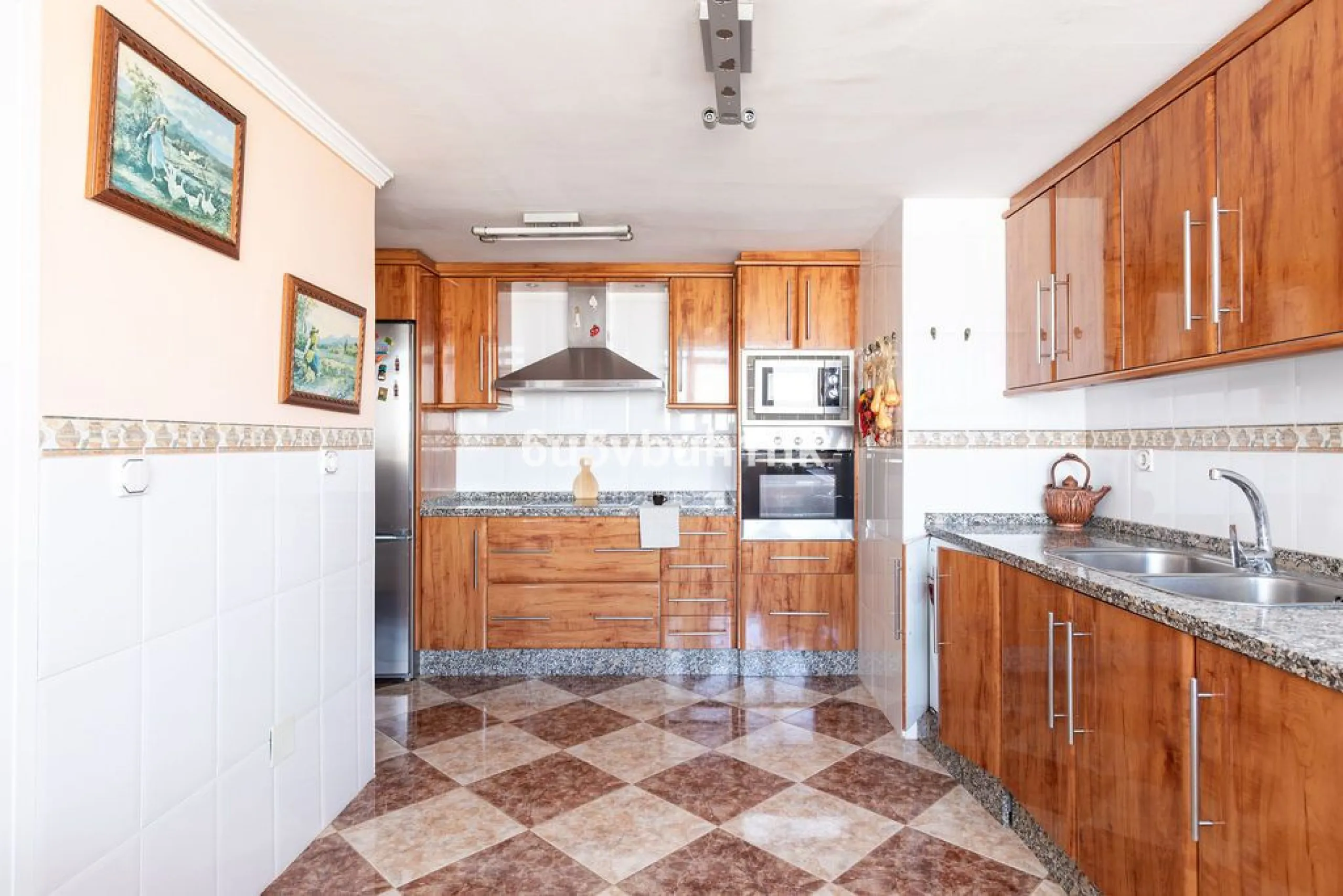 -Spacious three-bedroom apartment with large covered terrace overlooking a park