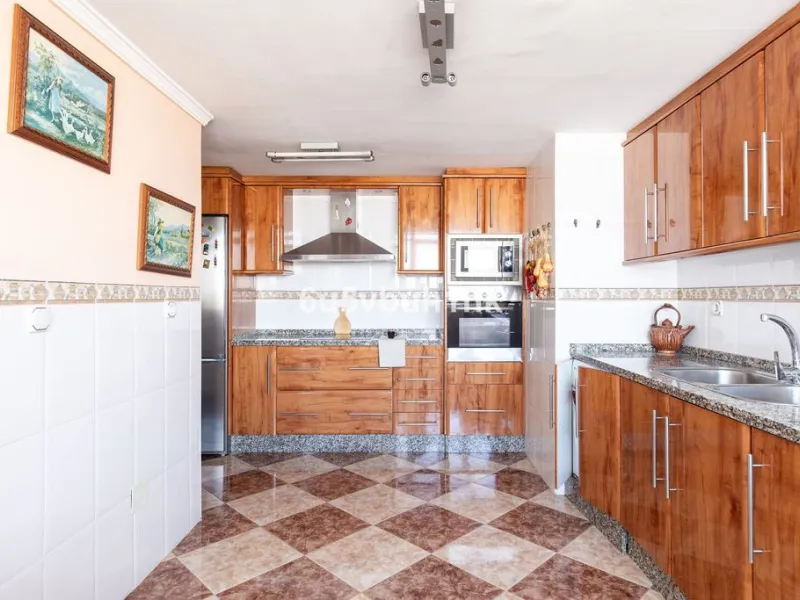 -Spacious three-bedroom apartment with large covered terrace overlooking a park