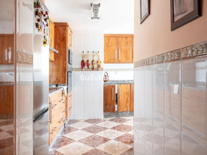 -Spacious three-bedroom apartment with large covered terrace overlooking a park