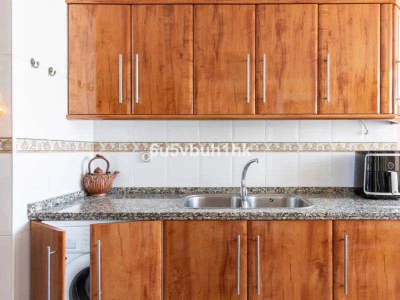 -Spacious three-bedroom apartment with large covered terrace overlooking a park