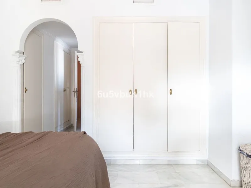 -Spacious three-bedroom apartment with large covered terrace overlooking a park