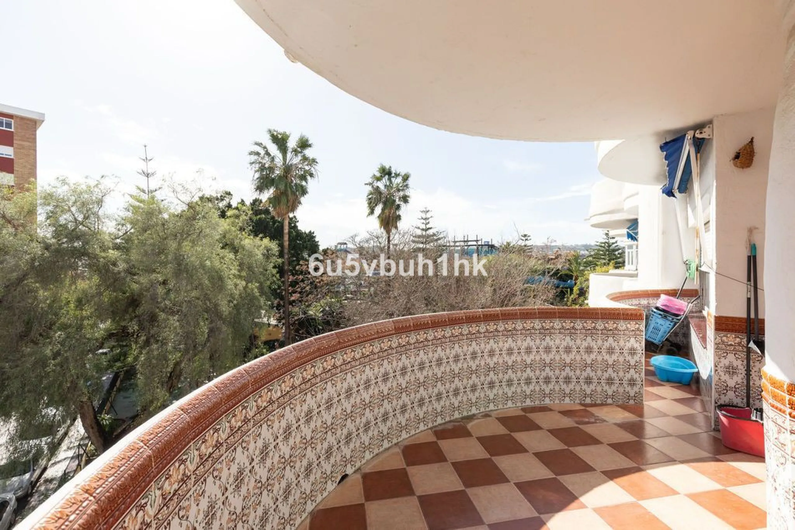 -Spacious three-bedroom apartment with large covered terrace overlooking a park