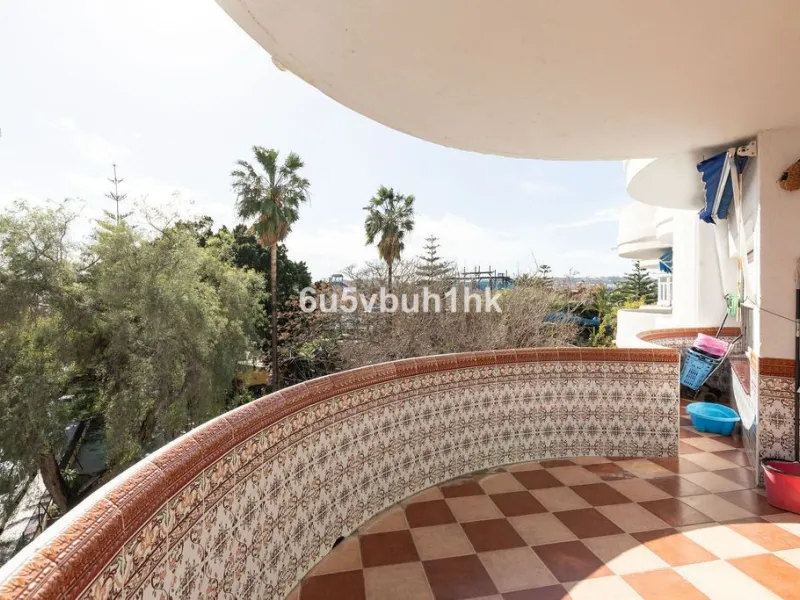 -Spacious three-bedroom apartment with large covered terrace overlooking a park