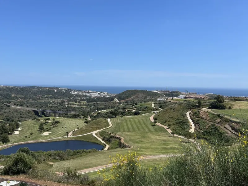 Uninterrupted Sea & Golf views!! This stunning luxury apartment near La Cala de Mijas is one of the best located within a secure, gated urbanisation, There are three spacious double bedrooms, all en-suite, plus a guest bathroom. As soon as you enter throu