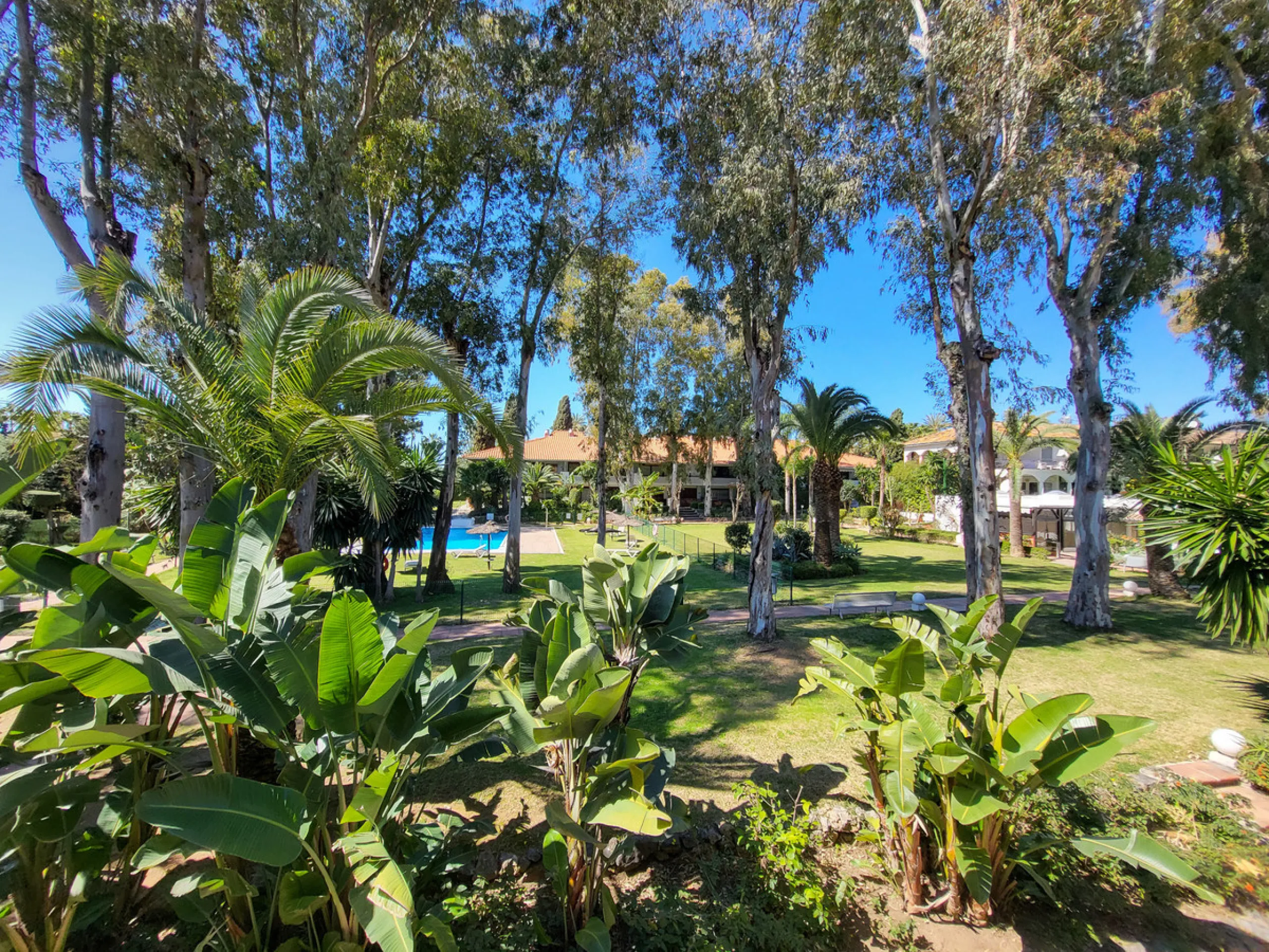 This is an excellent opportunity to own a beautifully renovated two-bedroom, two-bathroom apartment in a sought-after, gated community by the beach.