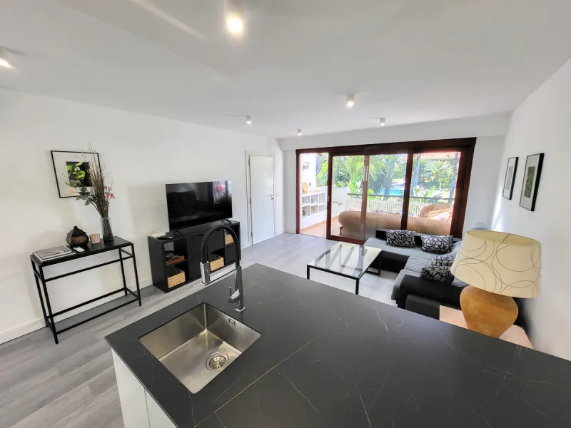 This is an excellent opportunity to own a beautifully renovated two-bedroom, two-bathroom apartment in a sought-after, gated community by the beach.