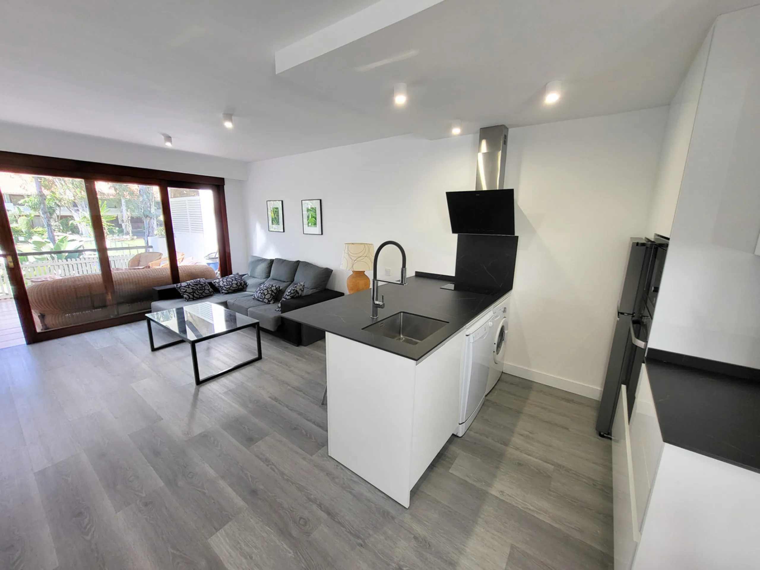This is an excellent opportunity to own a beautifully renovated two-bedroom, two-bathroom apartment in a sought-after, gated community by the beach.