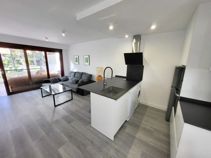 This is an excellent opportunity to own a beautifully renovated two-bedroom, two-bathroom apartment in a sought-after, gated community by the beach.