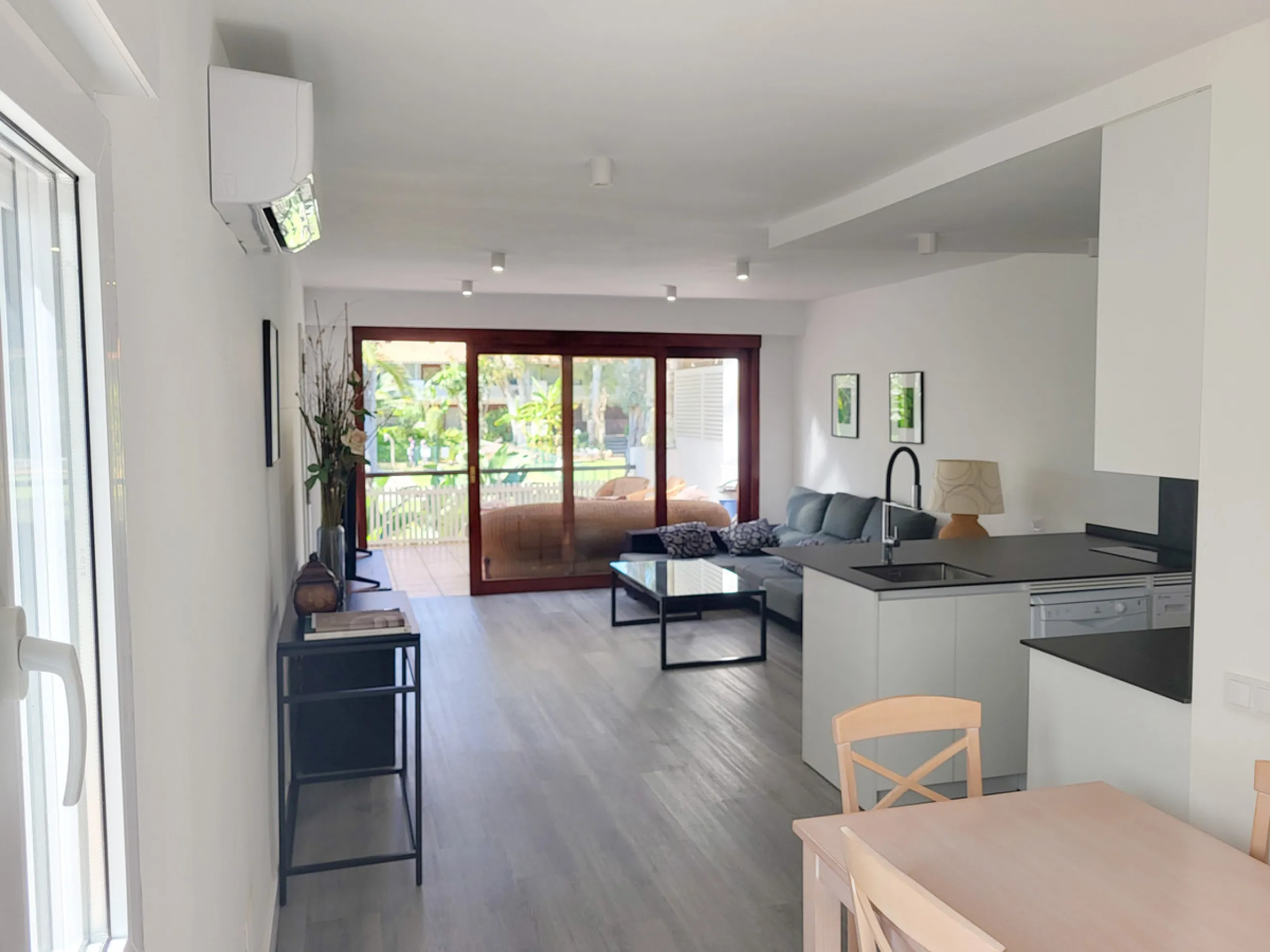 This is an excellent opportunity to own a beautifully renovated two-bedroom, two-bathroom apartment in a sought-after, gated community by the beach.