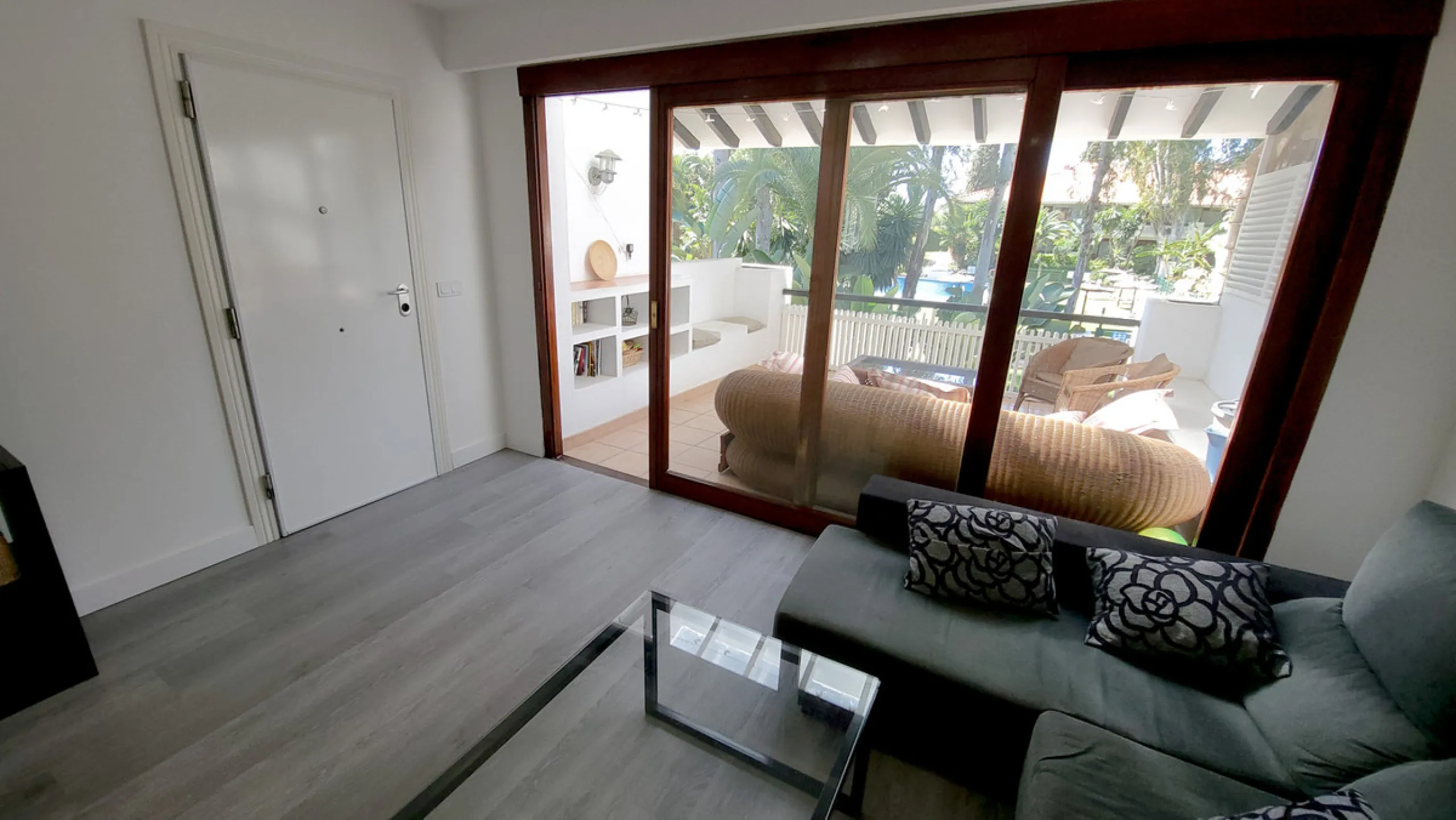 This is an excellent opportunity to own a beautifully renovated two-bedroom, two-bathroom apartment in a sought-after, gated community by the beach.