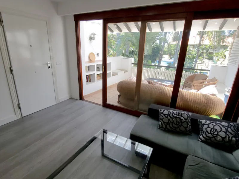 This is an excellent opportunity to own a beautifully renovated two-bedroom, two-bathroom apartment in a sought-after, gated community by the beach.