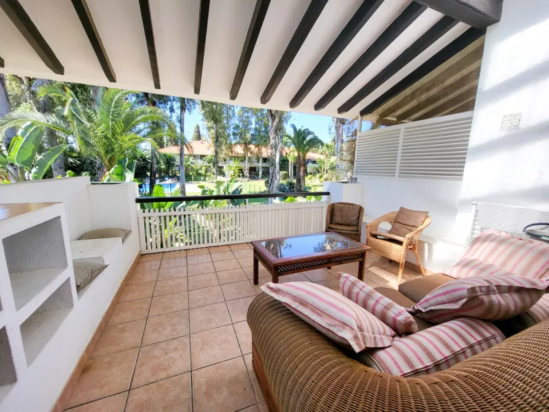 This is an excellent opportunity to own a beautifully renovated two-bedroom, two-bathroom apartment in a sought-after, gated community by the beach.