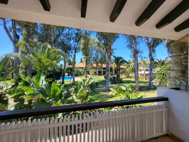 This is an excellent opportunity to own a beautifully renovated two-bedroom, two-bathroom apartment in a sought-after, gated community by the beach.