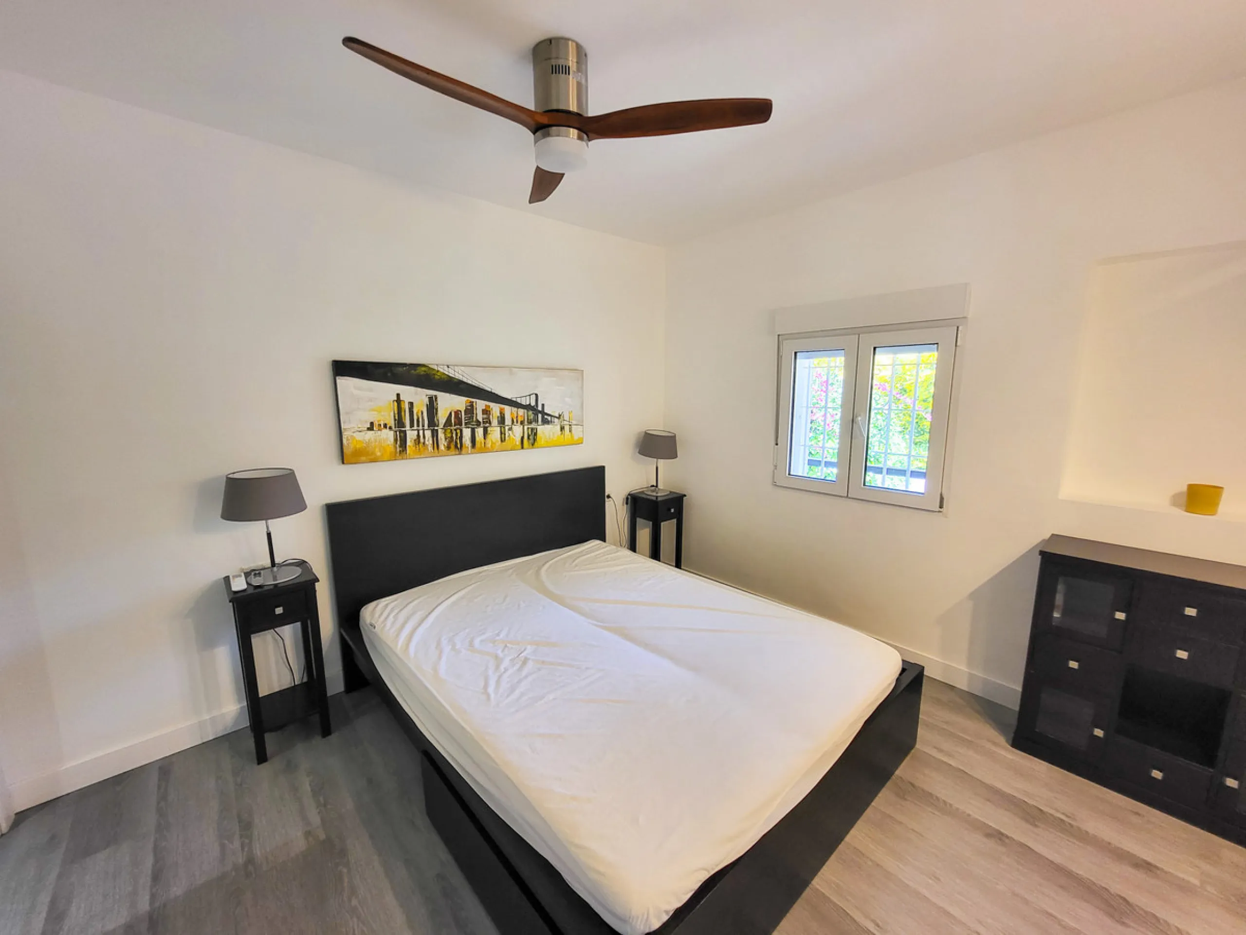 This is an excellent opportunity to own a beautifully renovated two-bedroom, two-bathroom apartment in a sought-after, gated community by the beach.