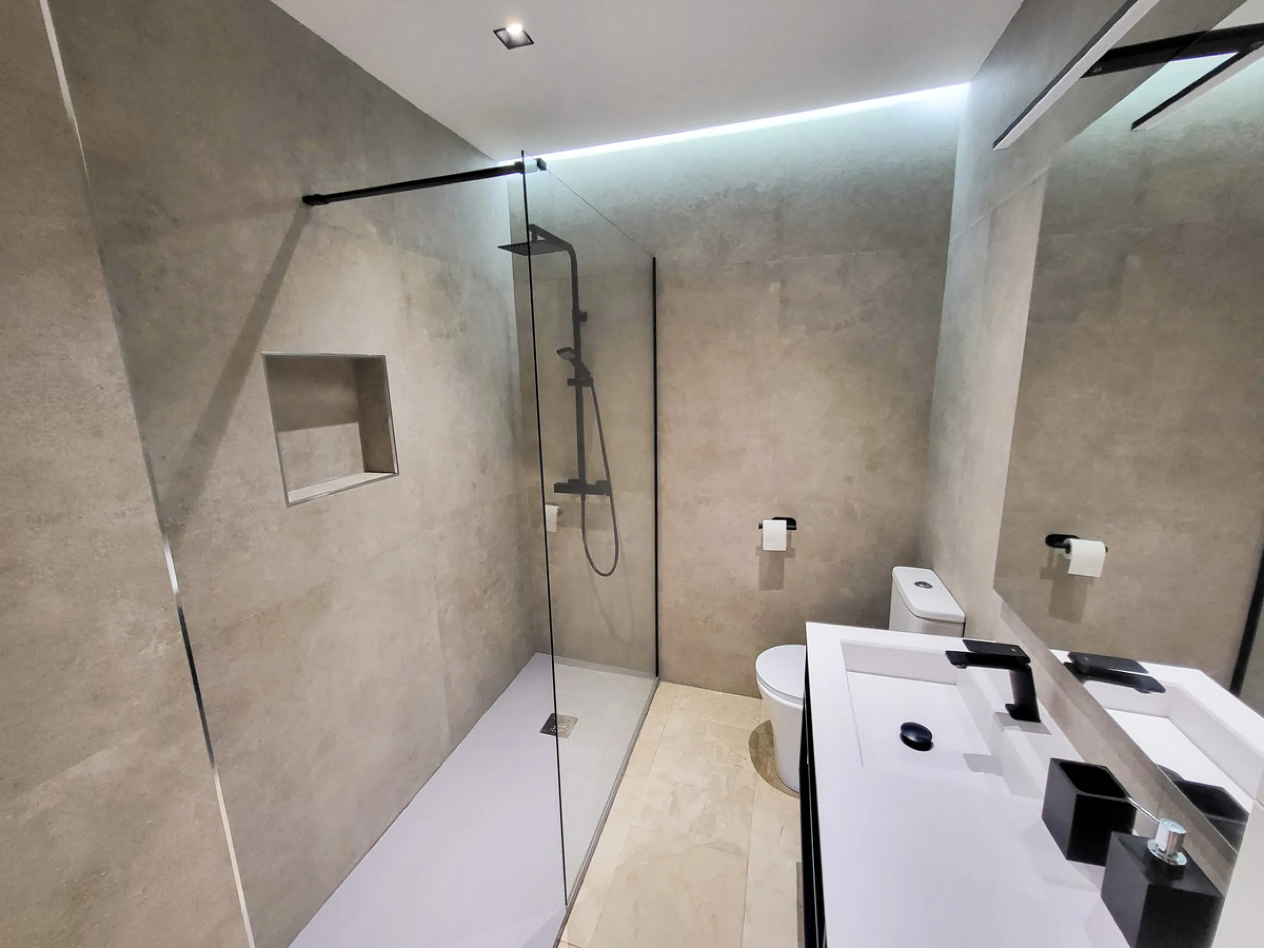 This is an excellent opportunity to own a beautifully renovated two-bedroom, two-bathroom apartment in a sought-after, gated community by the beach.