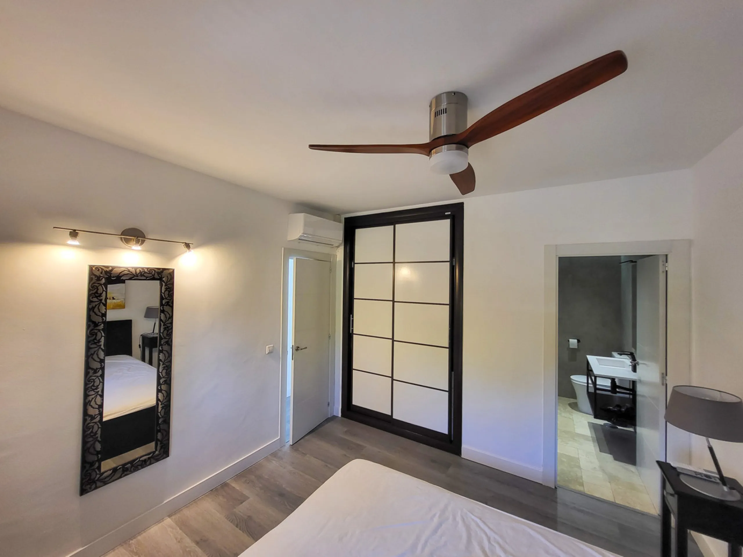 This is an excellent opportunity to own a beautifully renovated two-bedroom, two-bathroom apartment in a sought-after, gated community by the beach.